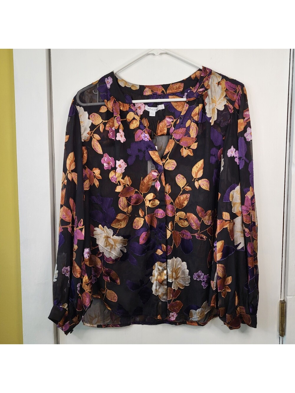 Chico's Floral Burnout Blouse black floral pattern long sleeves button-up front.